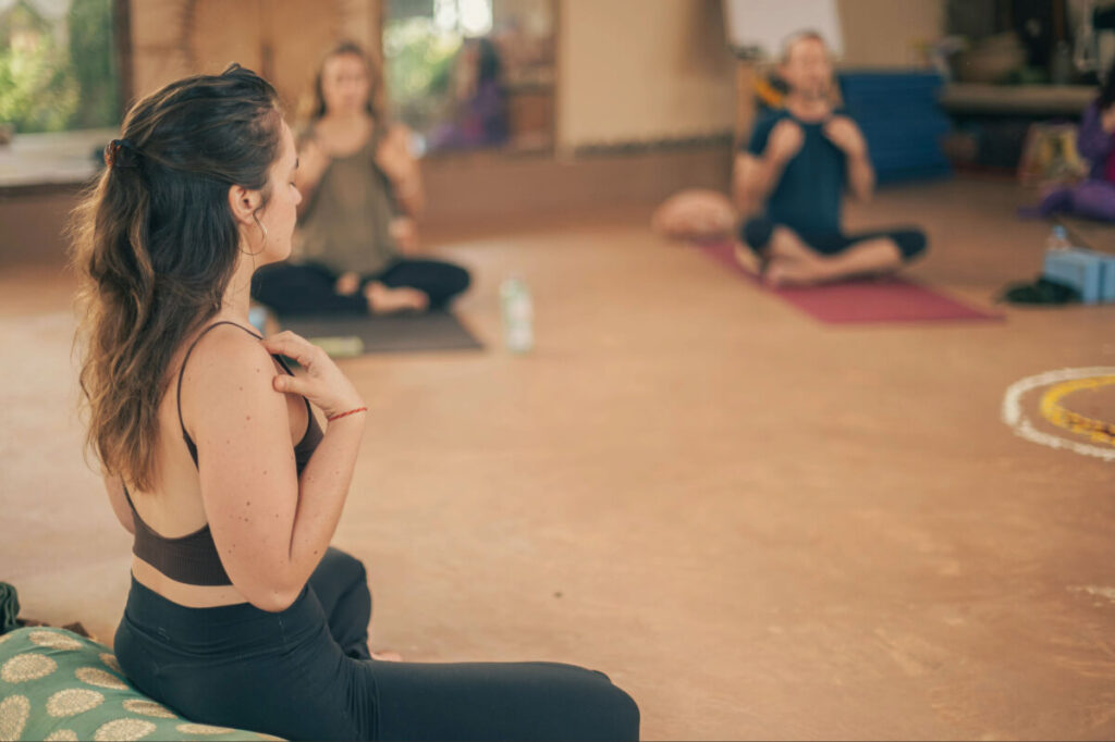 Trauma-informed somatic yoga class at Sohum Yoga School